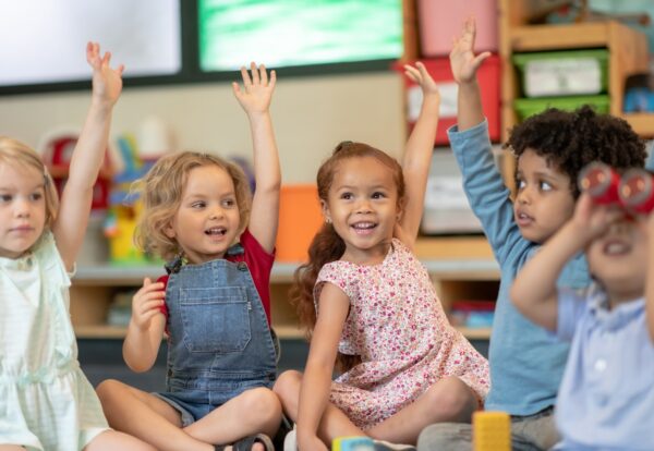 Multi-ethnic-group-of-students-in-class-1168223009_1258x838